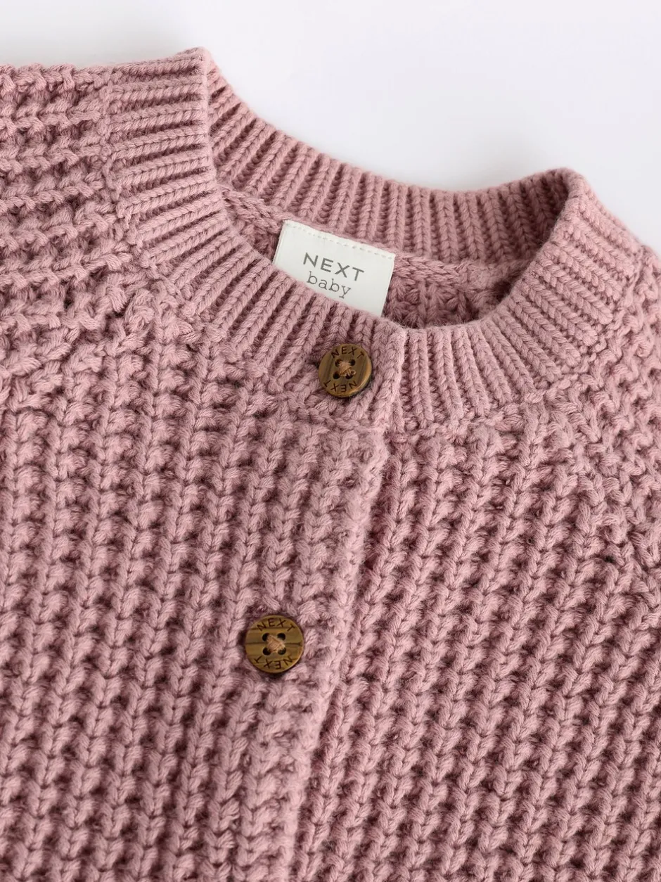 Gebreide Kleding|Next Roze - Gebreid babyvestje met geborduurde slogan op de rug (0mnd-2jr)