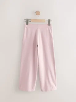 Broeken En Leggings|Next - Jersey broek met wijde pijpen (3-16 jr) Roze