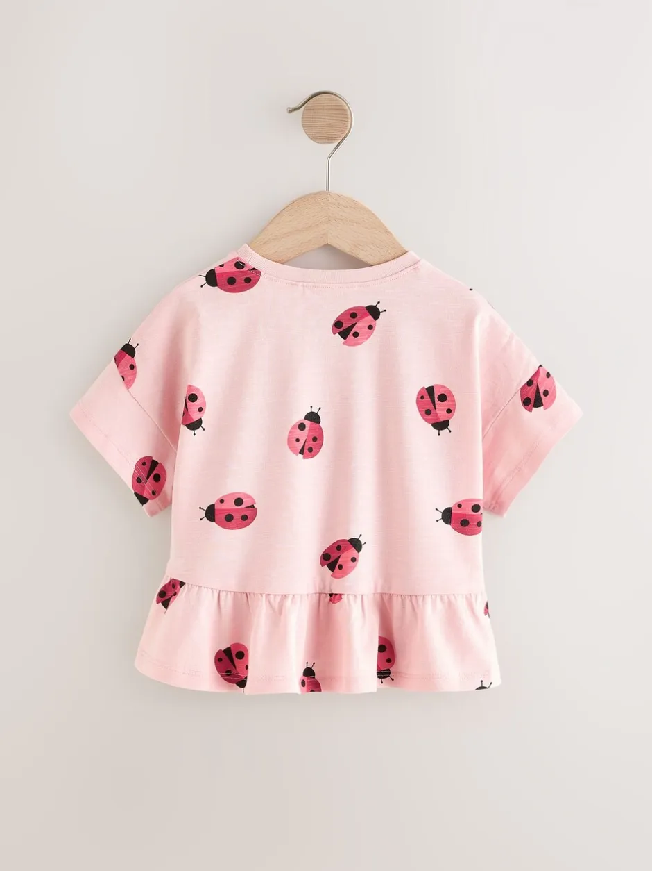 Tops|T-Shirts|Next Roze lieveheersbeestje - T-shirt met peplum en korte mouwen (3mnd -7jr)