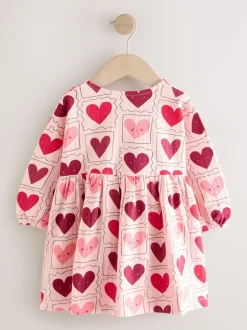 Jurken|Gelegenheidskleding|Next - Jersey jurk met lange mouwen (3 mnd-7 jr) Roze met hartjes