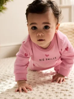 Sets En Outfits|Next - Jersey babyromper (0mnd-3jr) Roze met hartjesprint