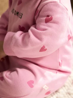 Sets En Outfits|Next - Jersey babyromper (0mnd-3jr) Roze met hartjesprint