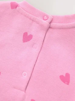 Sets En Outfits|Next - Jersey babyromper (0mnd-3jr) Roze met hartjesprint