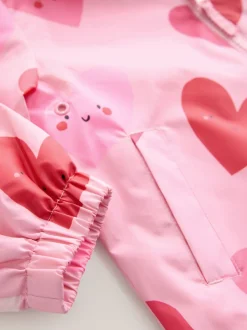 Jassen En Jacks*Next Roze met hartjesprint - Regenbestendig jack met print (3mnd-7jr)
