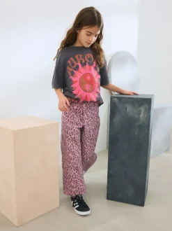 Jeans*Next - Jeans met wijde pijpen (3-16 jr) Roze met luipaardprint