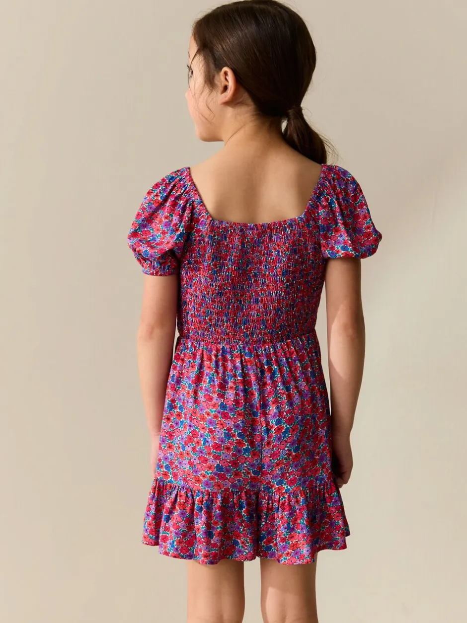Jumpsuits En Playsuits*Next Roze met vrolijke print - Romper met smokwerk (3-16jr)