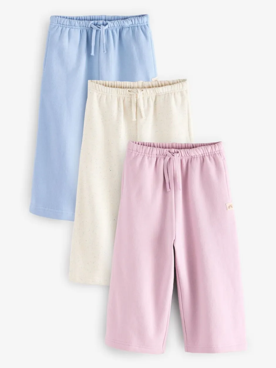 Jeans En Joggingbroeken|Next - Set van 3 joggingbroeken met wijde pijpen (3mnd-7jr) Roze/blauw/beigebruin