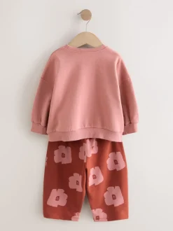 Sets En Combisets|Truien En Breisels*Next Roze/bruine tomaat - Set van sweatshirt en joggingbroek met rechte wijde pijpen (3mnd -7jr)