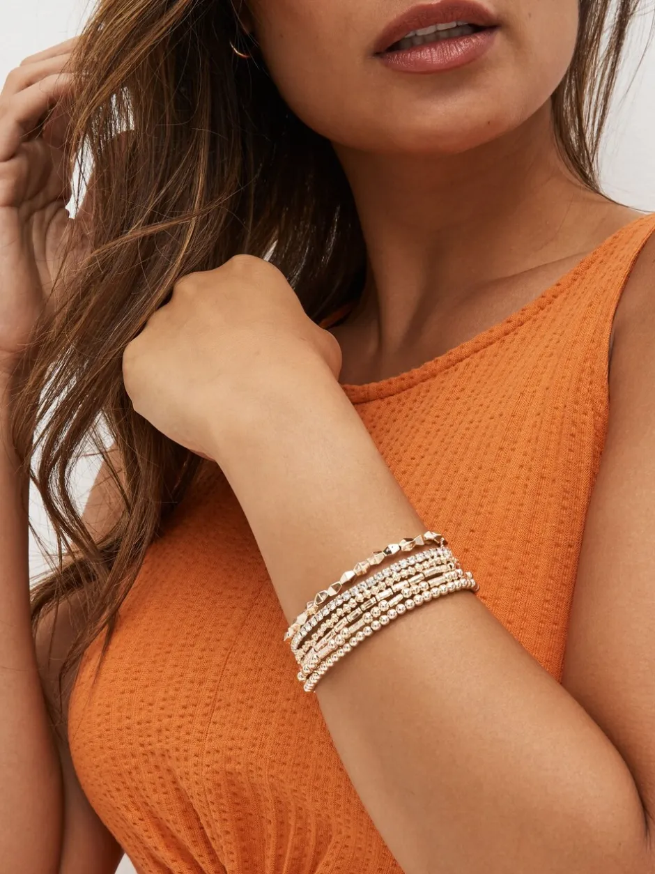Sieraden|Next - Set van glinsterende rekbare armbanden Rozegouden tinten