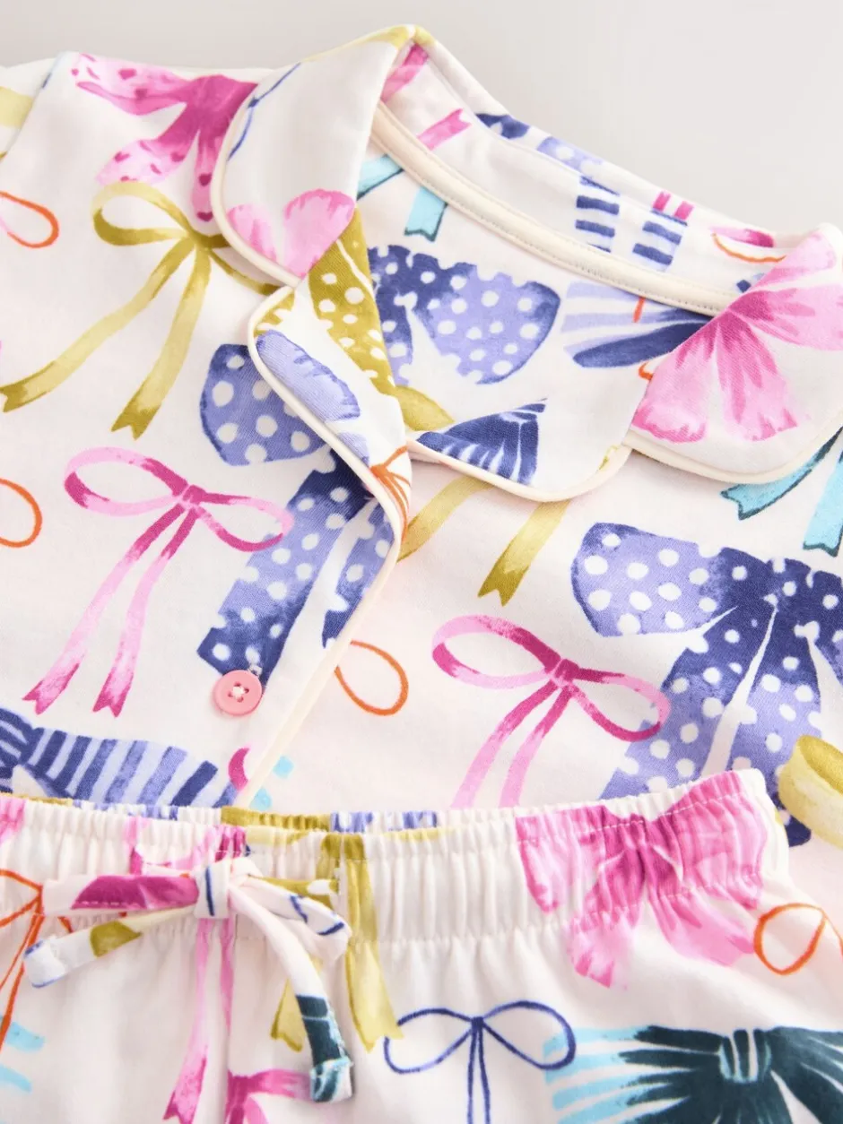 Nachtkleding En Pyjama's|Pyjama's*Next - Pyjama met knoopsluiting (3-16jr) Roze/Groene strikprint