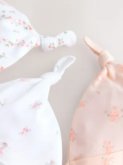 Mutsjes En Antikrabwantjes|Mutsen, Handschoenen En Sjaals|Next Roze/wit - Set van 3 babymutsen met strik (0-12mnd)