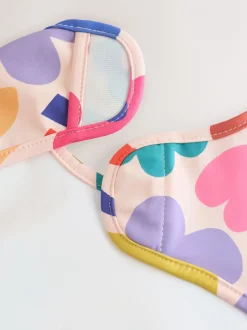 Slabbetjes|Next Stampy Bloemenprint - Slabbetje met mouwen voor spenen en voeden
