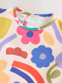 Slabbetjes|Next Stampy Bloemenprint - Slabbetje met mouwen voor spenen en voeden