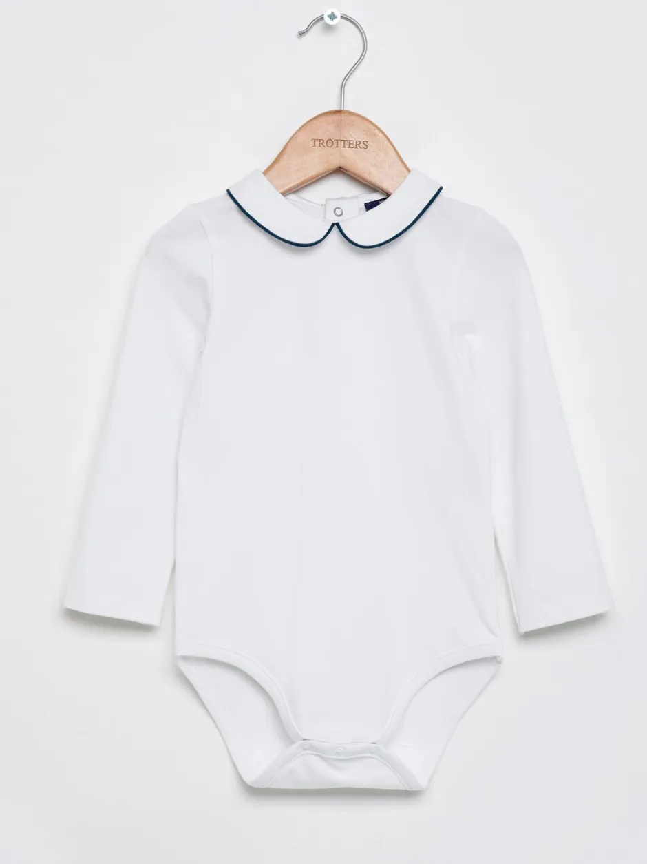 Rompertjes En Hemdjes|Trotters London witte Milo body met bies en lange mouwen