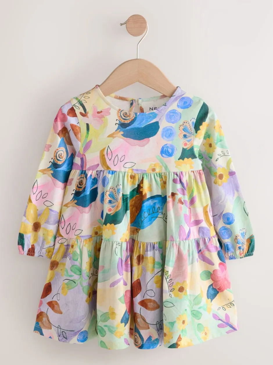 Jurken*Next - Jurk met lange mouwen en stroken (3mnd -7jr) Vrolijke bloemenprint