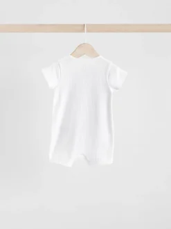 Rompertjes En Tuinbroeken|Next - Verpakking van 3 babyrompertjes 100% katoen met tweewegrits (0mnd -3jr) Wit