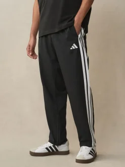 Sportkleding|Joggingbroeken*adidas - Essentials 3-Strepen Stanford joggingbroek met open zoom Zwart