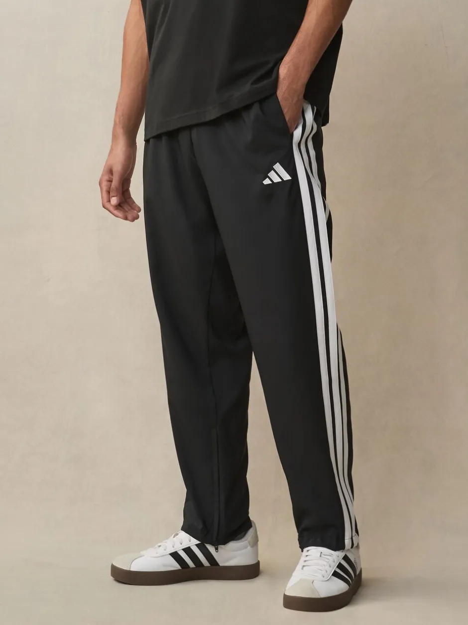 Sportkleding|Joggingbroeken*adidas - Essentials 3-Strepen Stanford joggingbroek met open zoom Zwart