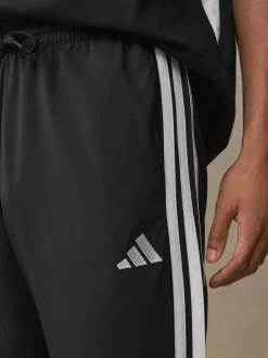 Sportkleding|Joggingbroeken*adidas - Essentials 3-Strepen Stanford joggingbroek met open zoom Zwart