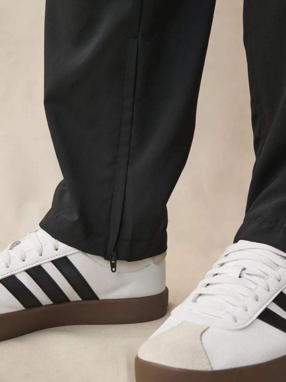 Sportkleding|Joggingbroeken*adidas - Essentials 3-Strepen Stanford joggingbroek met open zoom Zwart