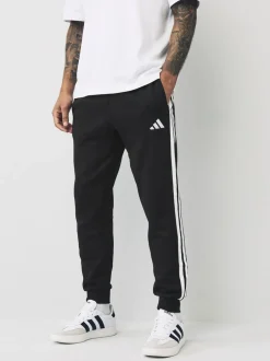 Joggingbroeken*adidas - Essentials fleece joggingbroek met 3 strepen Zwart