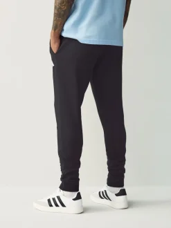 Joggingbroeken|adidas - Essentials Feelcozy fleece joggingbroek Zwart