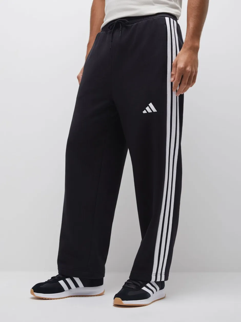 Joggingbroeken|adidas - Essentials Three Stripes Fleece Wide Leg Trousers Zwart