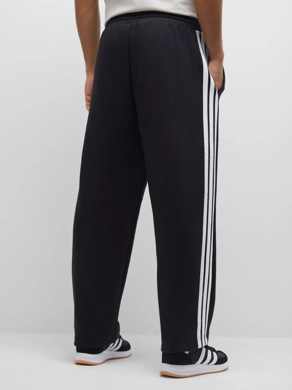Joggingbroeken|adidas - Essentials Three Stripes Fleece Wide Leg Trousers Zwart