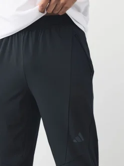 Sportkleding|Joggingbroeken*adidas - hybride joggingbroek ontworpen voor training Zwart