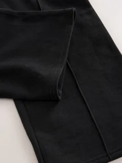 Broeken En Leggings*Next - Joggingbroek met wijde pijpen (3-16jr) Zwart