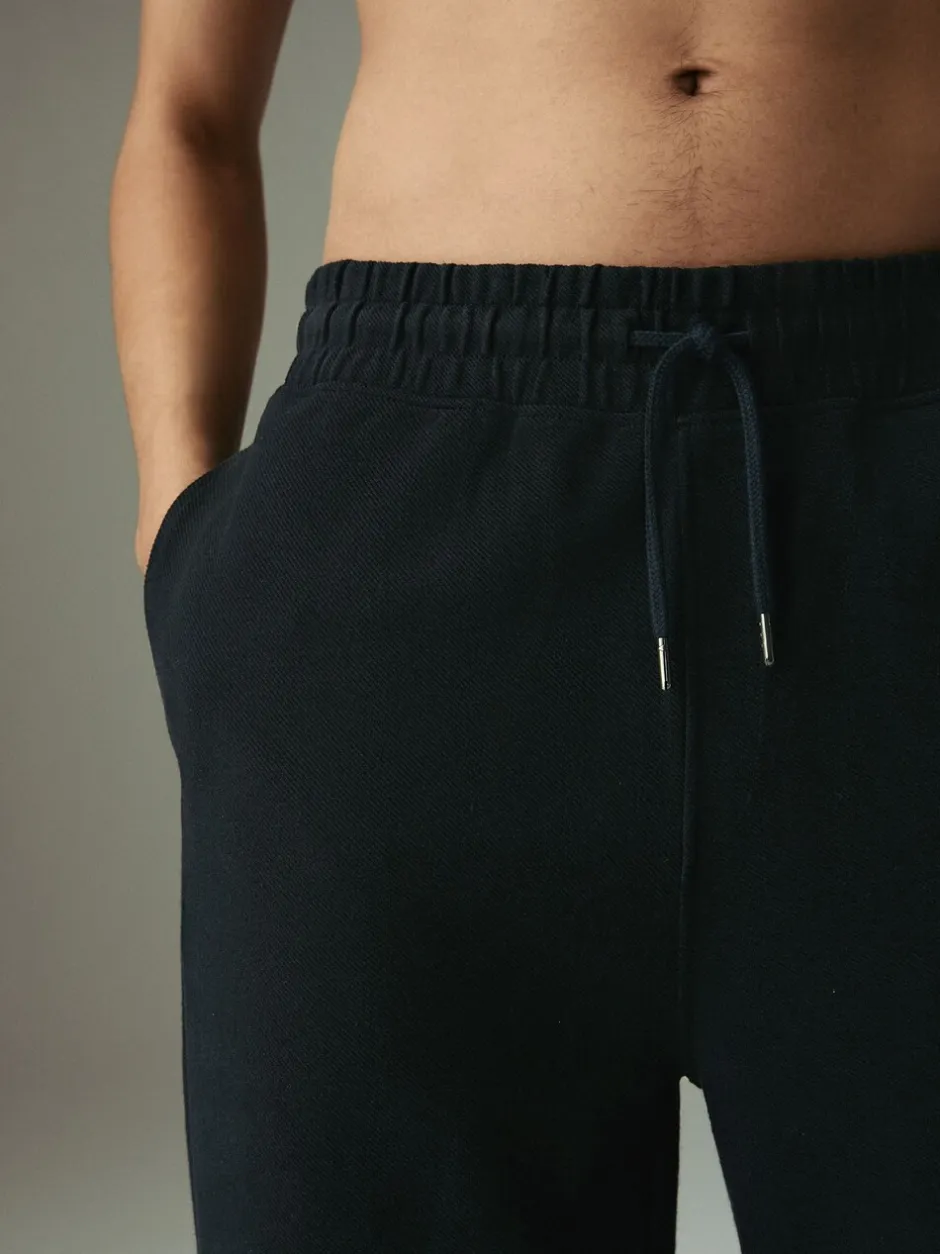 Joggingbroeken*Next - Joggingbroek van keperstof met rechte pijpen en textuur Zwart