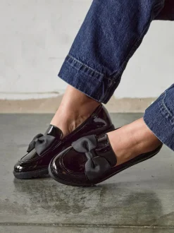 Lage Schoenen*Linzi - Cathy loafers met plateauzool en grote strik Zwart