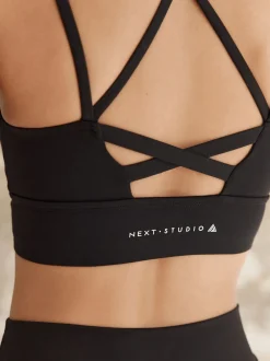 Beha's|Sportkleding*Next - Medium impact sportbeha met bandjes achter Zwart