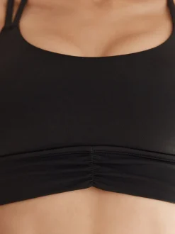 Beha's|Sportkleding*Next - Medium impact sportbeha met bandjes achter Zwart