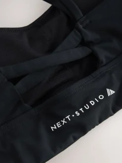 Beha's|Sportkleding*Next - Medium impact sportbeha met bandjes achter Zwart