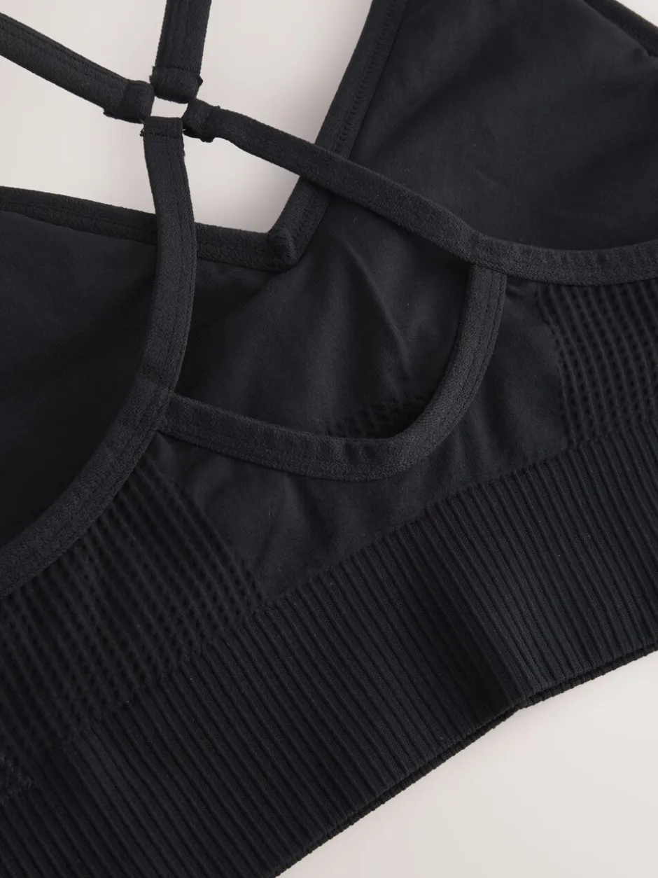 Beha's|Sportkleding|Next - Naadloze sportbeha met bandjes Zwart