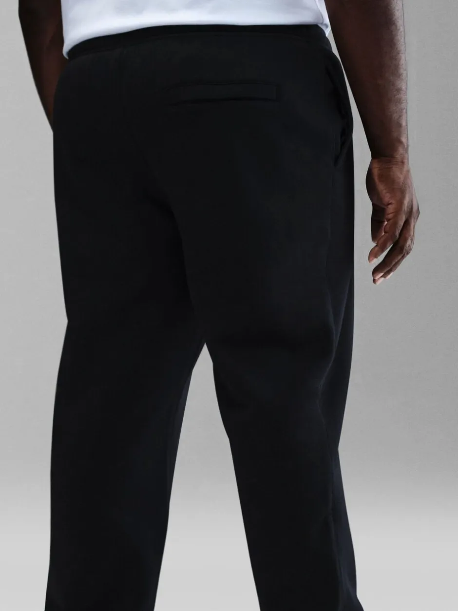 Joggingbroeken|Sportkleding*Nike - Club Fleece joggingbroek met wijde pijpen Zwart