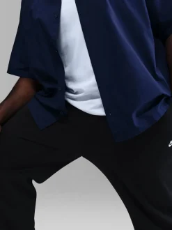 Joggingbroeken|Sportkleding*Nike - Club Fleece joggingbroek met wijde pijpen Zwart