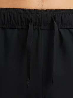 Joggingbroeken*Nike Zwart - Dri-FIT Form trainingsbroek met taps toelopende pijpen