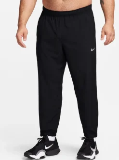 Joggingbroeken*Nike Zwart - Dri-FIT Form trainingsbroek met taps toelopende pijpen