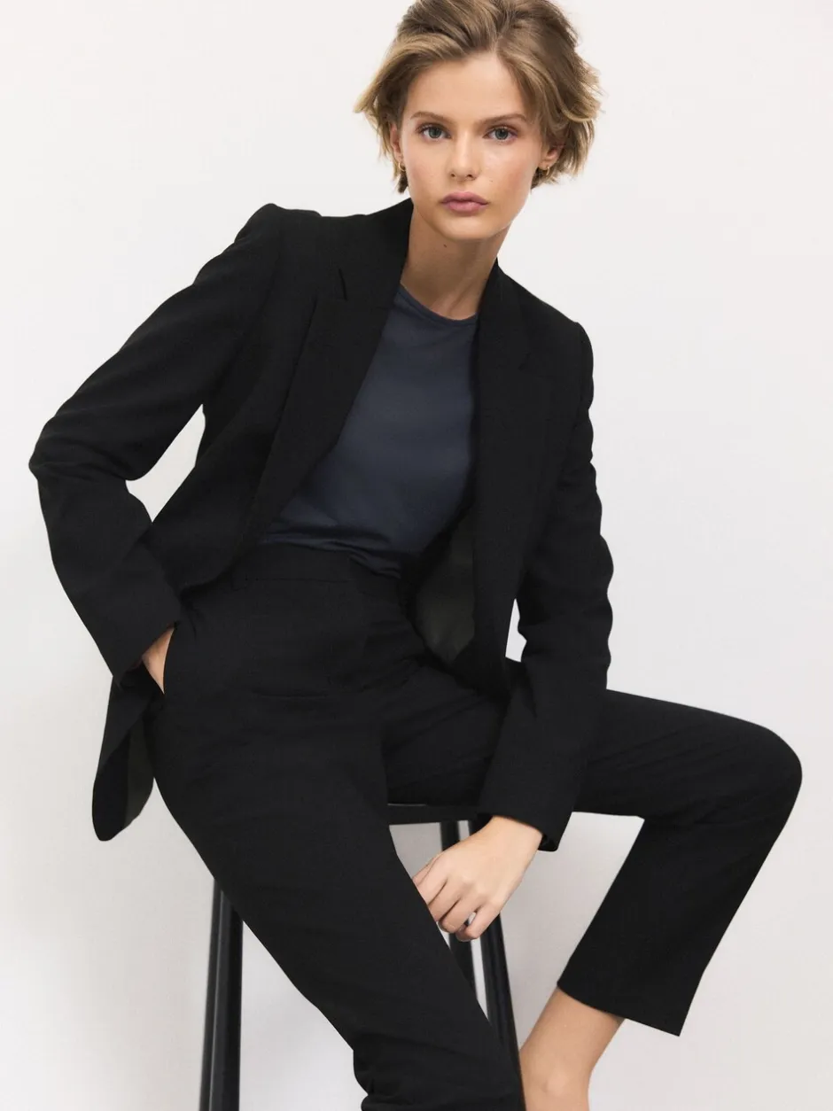 Kostuums En Werkkleding*Next - Op maat gemaakte blazer met enkele rij knopen van wol Zwart