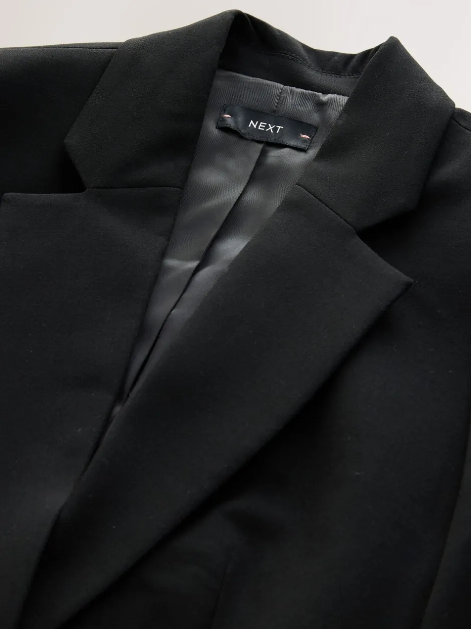 Kostuums En Werkkleding*Next - Op maat gemaakte blazer met enkele rij knopen van wol Zwart