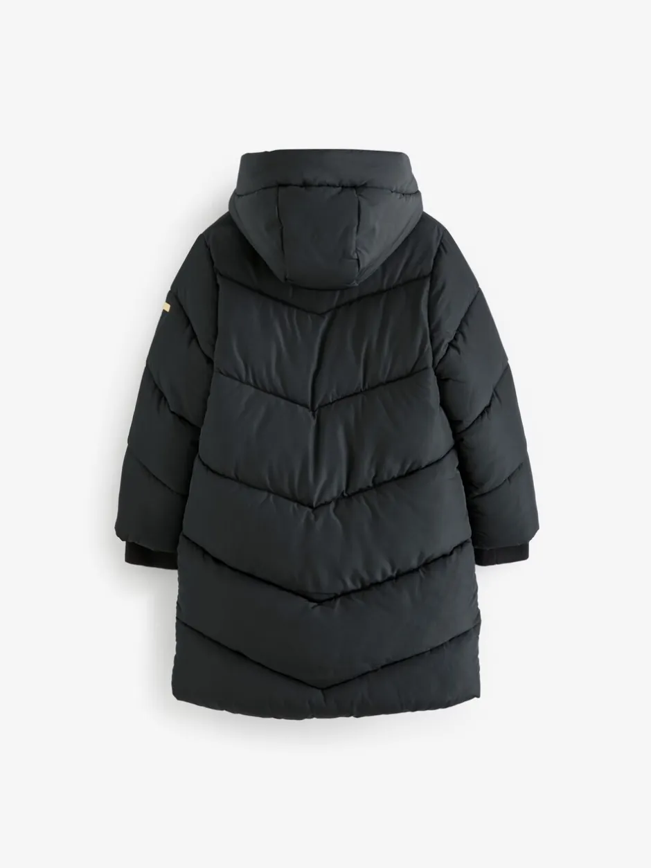 Schoolkleding|Jassen En Jacks|Next - Regenbestendige gewatteerde jas met capuchon en imitatiebontvoering (3 - 16 jr) Zwart
