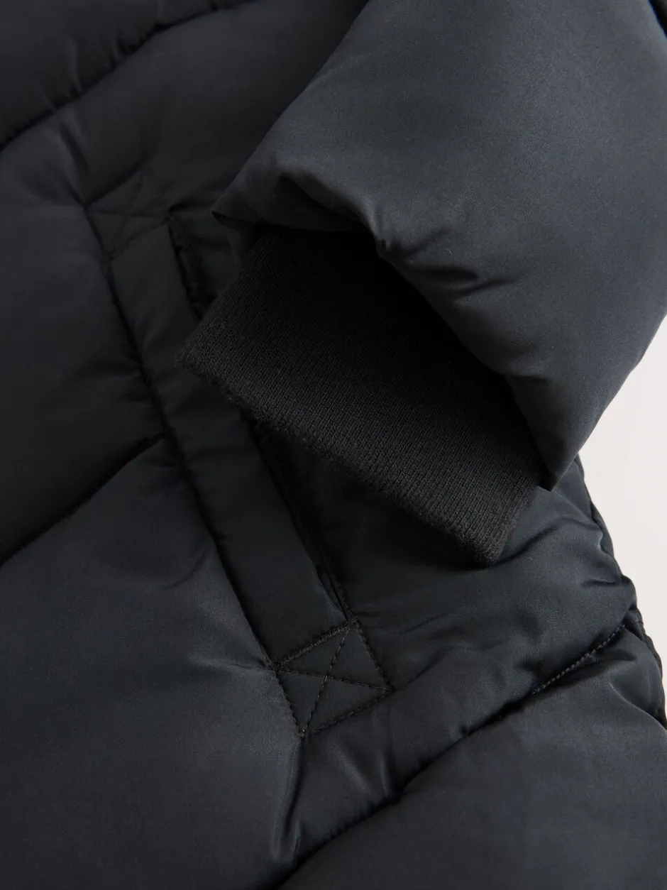 Schoolkleding|Jassen En Jacks|Next - Regenbestendige gewatteerde jas met capuchon en imitatiebontvoering (3 - 16 jr) Zwart