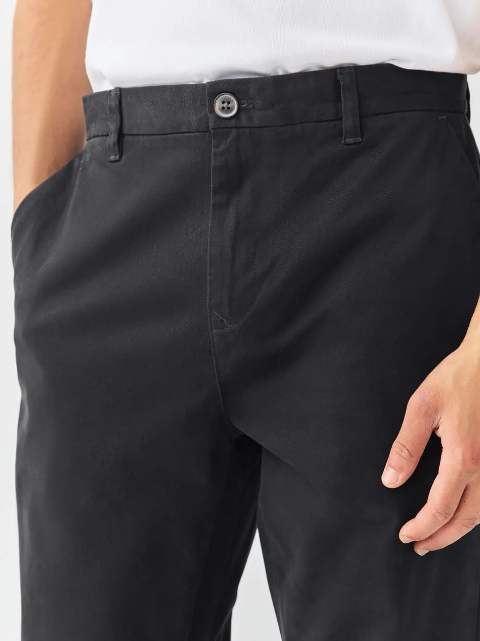 Broeken En Chino's|Next Zwart - Standaard toelopende pasvorm - Stretchy chino