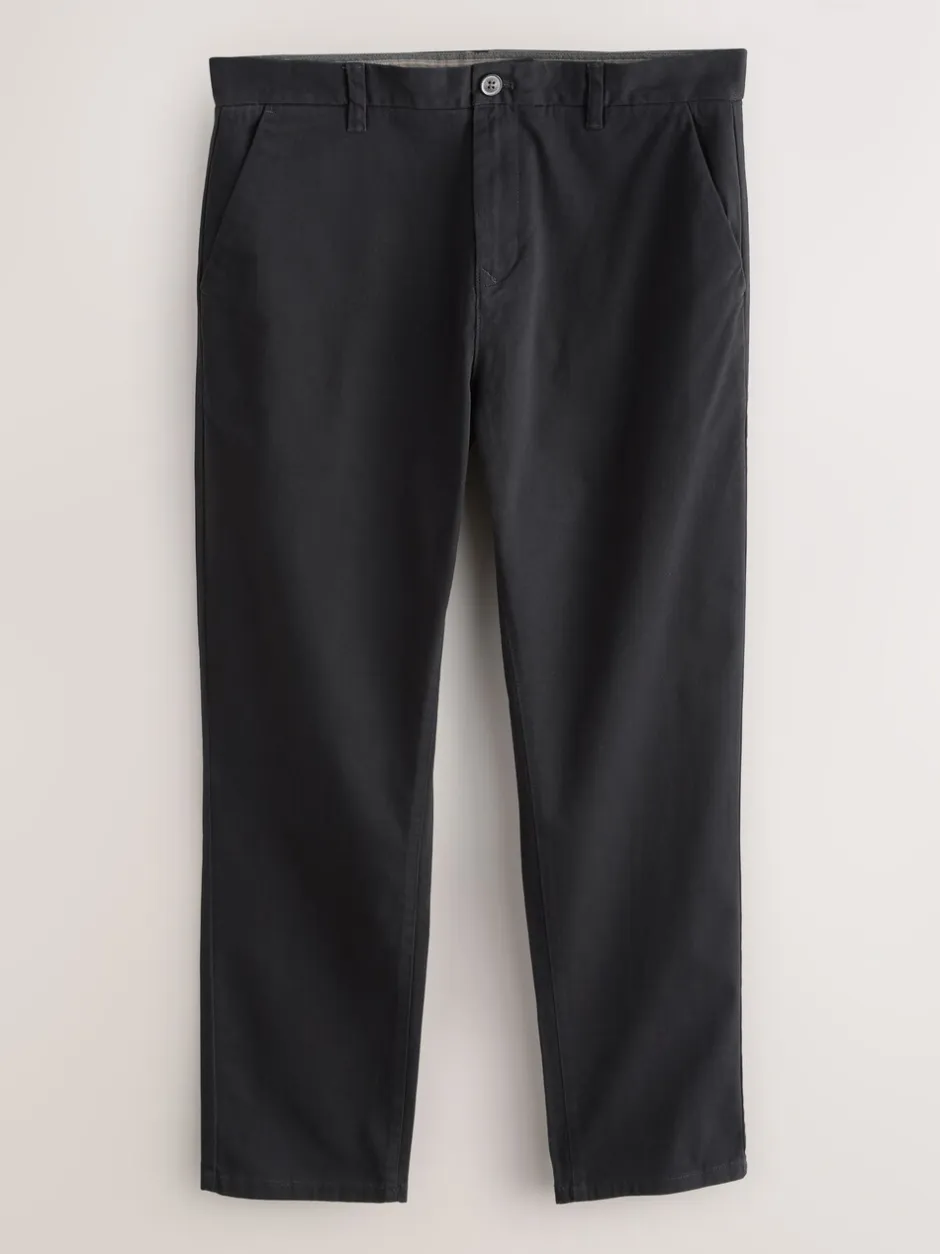 Broeken En Chino's|Next Zwart - Standaard toelopende pasvorm - Stretchy chino