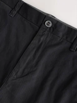 Broeken En Chino's|Next Zwart - Standaard toelopende pasvorm - Stretchy chino