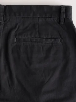 Broeken En Chino's|Next Zwart - Standaard toelopende pasvorm - Stretchy chino