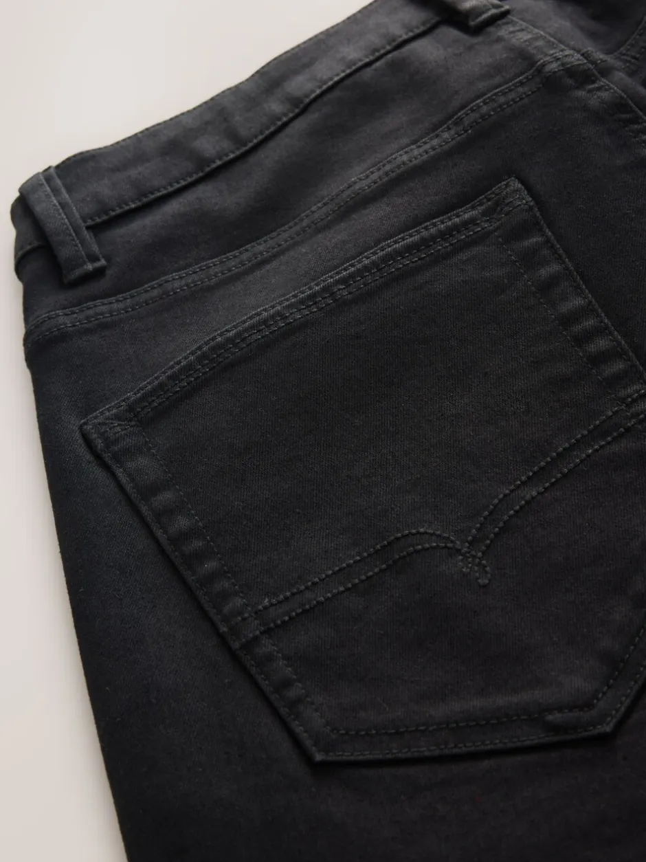 Jeans*Next Zwart - Standaard toelopende pasvorm - Motionflex jeans