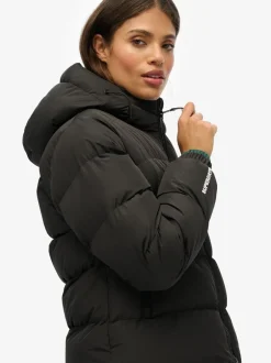 Jassen En Jacks*Superdry Zwart - - Gewatteerd sportjack met capuchon
